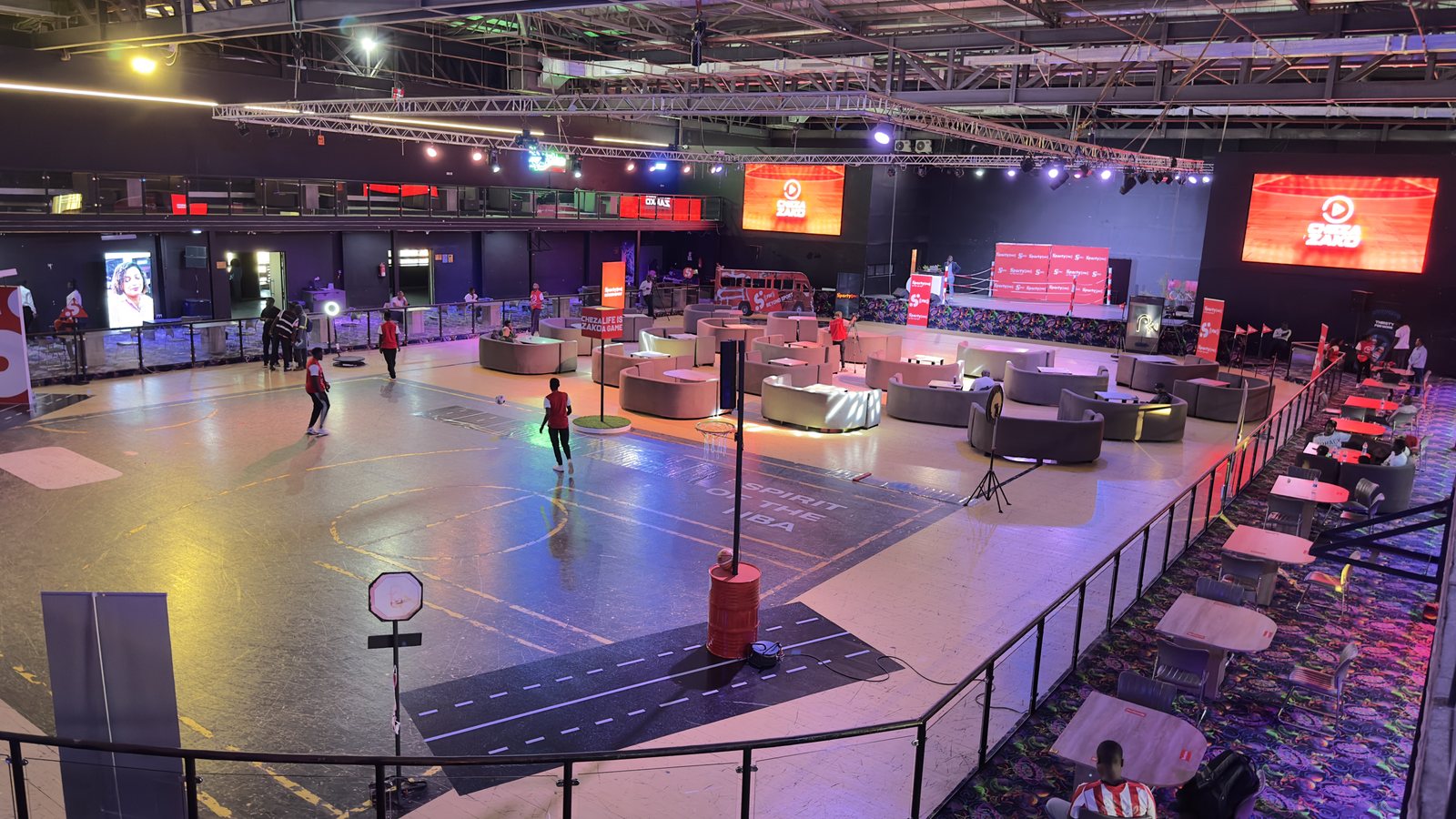 SportyBet immersive brand arena built by Red Giant, with lounge seating around a central playing surface