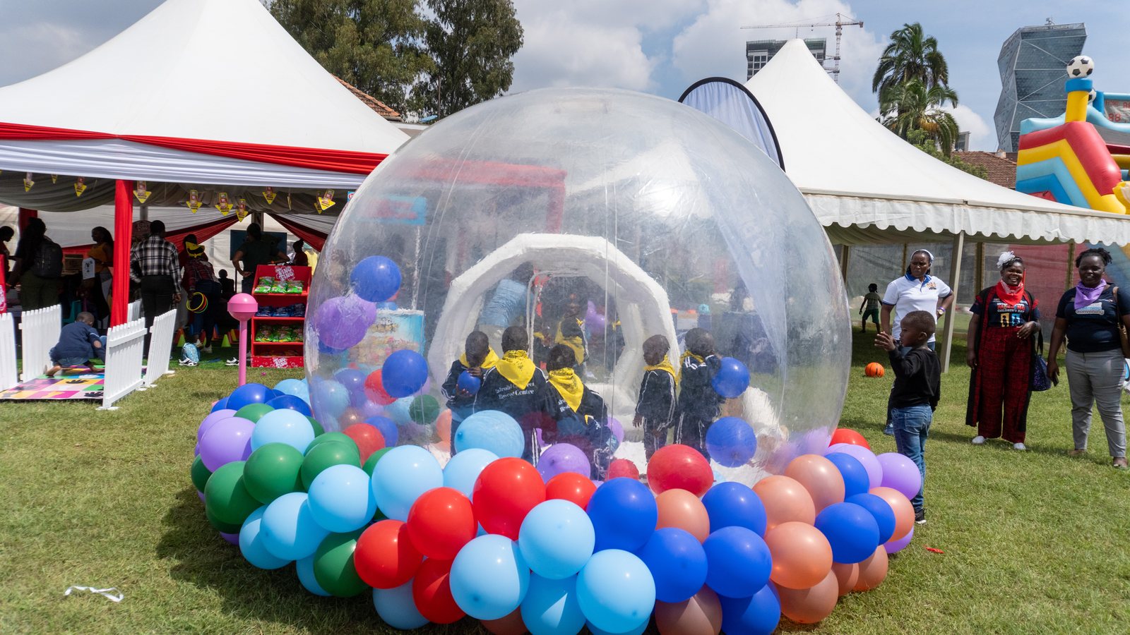 Children inside an inflatable dome at a Ting Ting outdoor activation produced by Red Giant